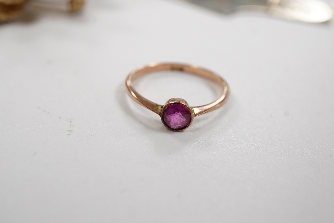 A 9ct and cabochon black onyx set pendant, on a 9ct chain, a 9ct and gem set ring and pair of 9ct and cultured pearl set ear clips, together with other items including costume jewellery, a silver bangle and a silver book